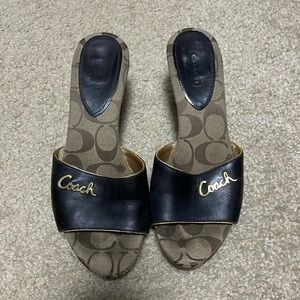 Coach clogs in used condition but still look nice